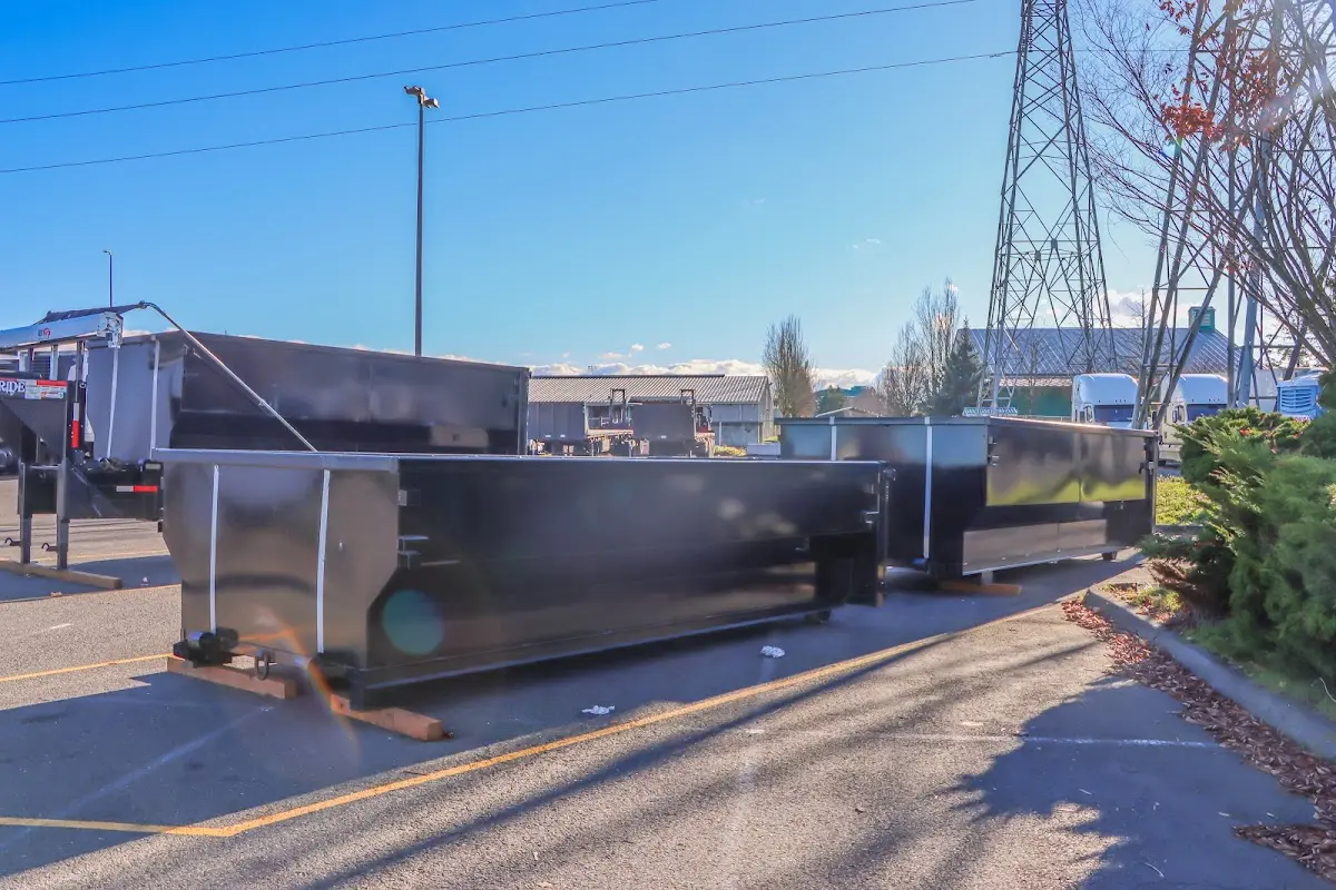 Roll-off dumpster ready for waste disposal at job site for 30 Yard Dumpster Rental in London